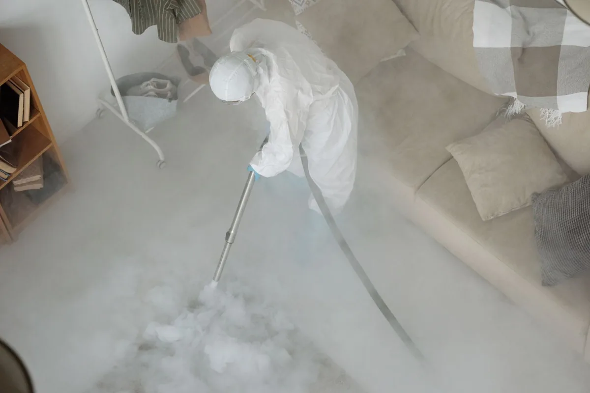 Biohazard cleanup technician in protective equipment, Mounds View, MN